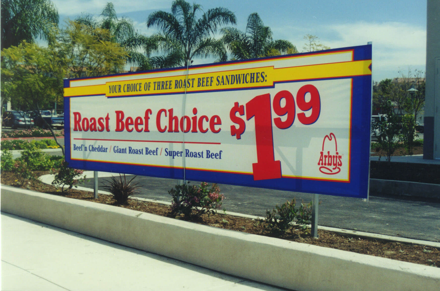 Sign Board displays for outdoor marketing from Voxpop Marketing Systems A banner in banner frames being used for lawn displays as exterior merchandising